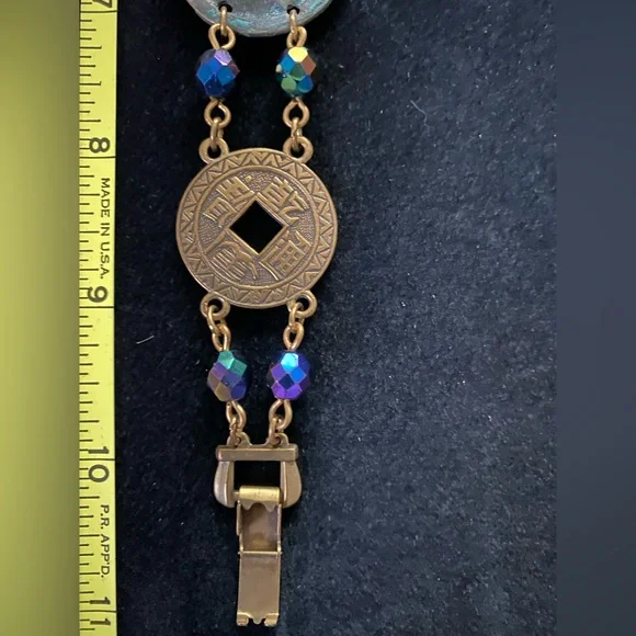 Bracelet with coin-like disks and iridescent beads. - Picture 3 of 7